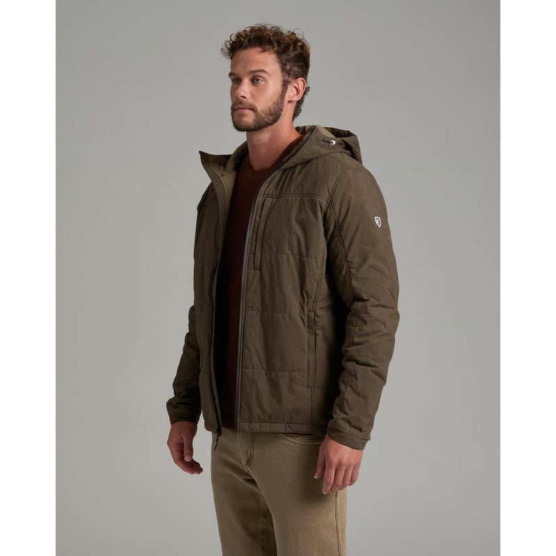 The side of a person wearing a green jacket on a white background