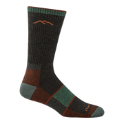 Black patterned crew socks on a white background.