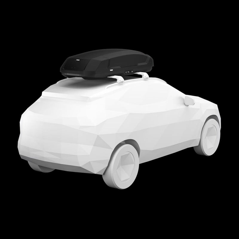 White car with a black roof box on a transparent background