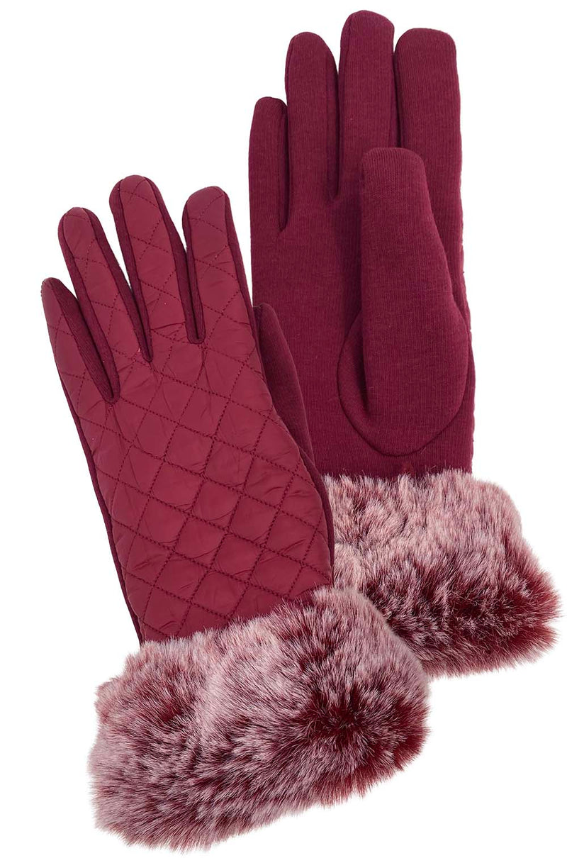 Top and bottom view of a pair of red fur lined gloves against a white background. 
