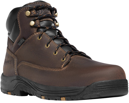 Brown work boot with black sole on a white background