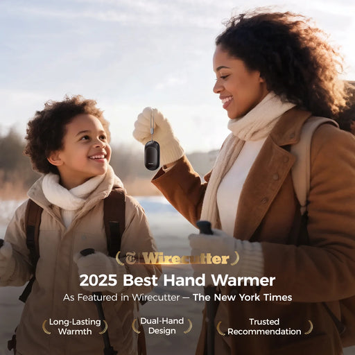 Woman and child holding hand warmers with Wirecutter 2025 Best Hand Warmer label.