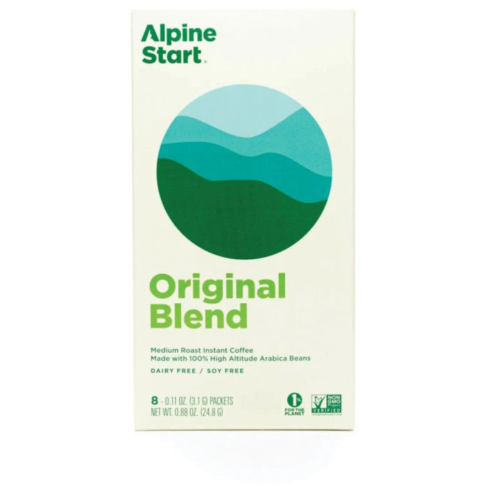Alpine Start Original Blend medium roast instant coffee in a cream-colored box with green and teal branding and a circular mountain graphic.