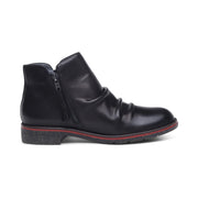 Black leather ankle boot on a white background