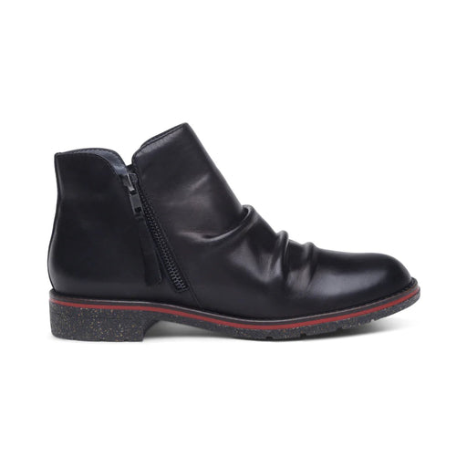 Black leather ankle boot on a white background