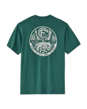 Green t-shirt with a circular graphic design on the back against a white background