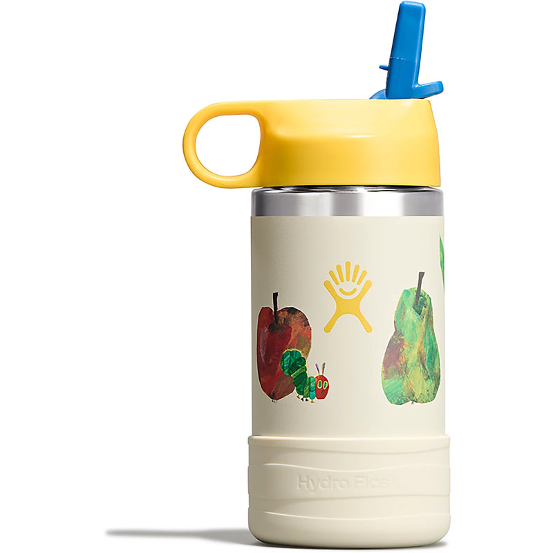 Tan Hydro Flask cup with cartoonish apple and caterpillar design against a white background. 