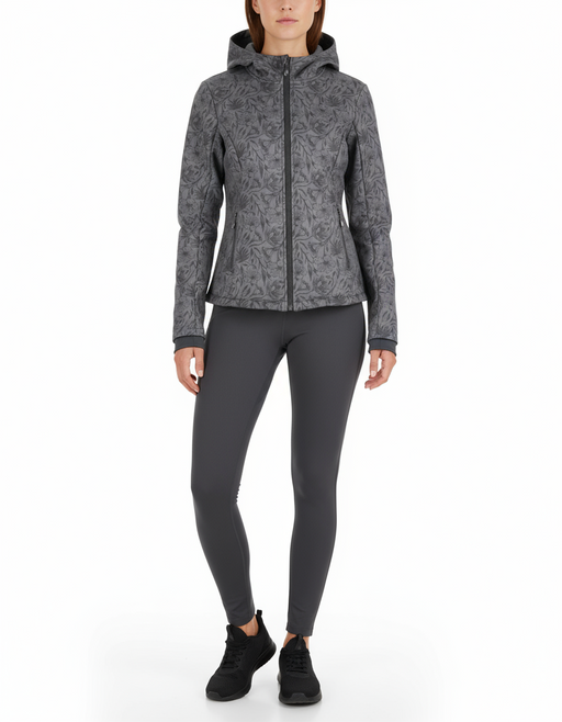 Black and grey floral print soft shell jacket worn by a model with dark grey leggings and black sneakers