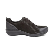 Side view of a black hiking sneaker against a white background. 