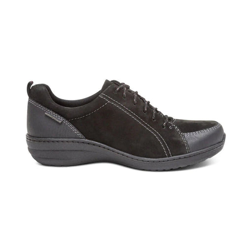 Side view of a black hiking sneaker against a white background. 