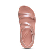 Pink sandal on a white background