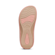Pink and beige shoe sole on a white background