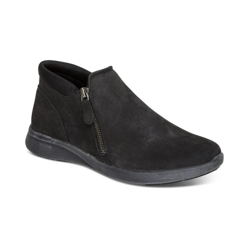 Black suede ankle boot with a zipper on a white background