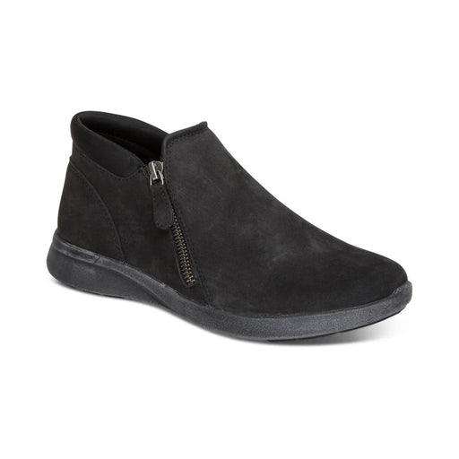 Black suede ankle boot with a zipper on a white background