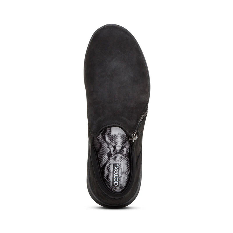 Black ankle boot with a brand logo on a white background
