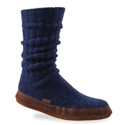 A blue slipper sock with a purple bottom on a white background