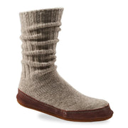 A gray slipper sock with a purple bottom on a white background