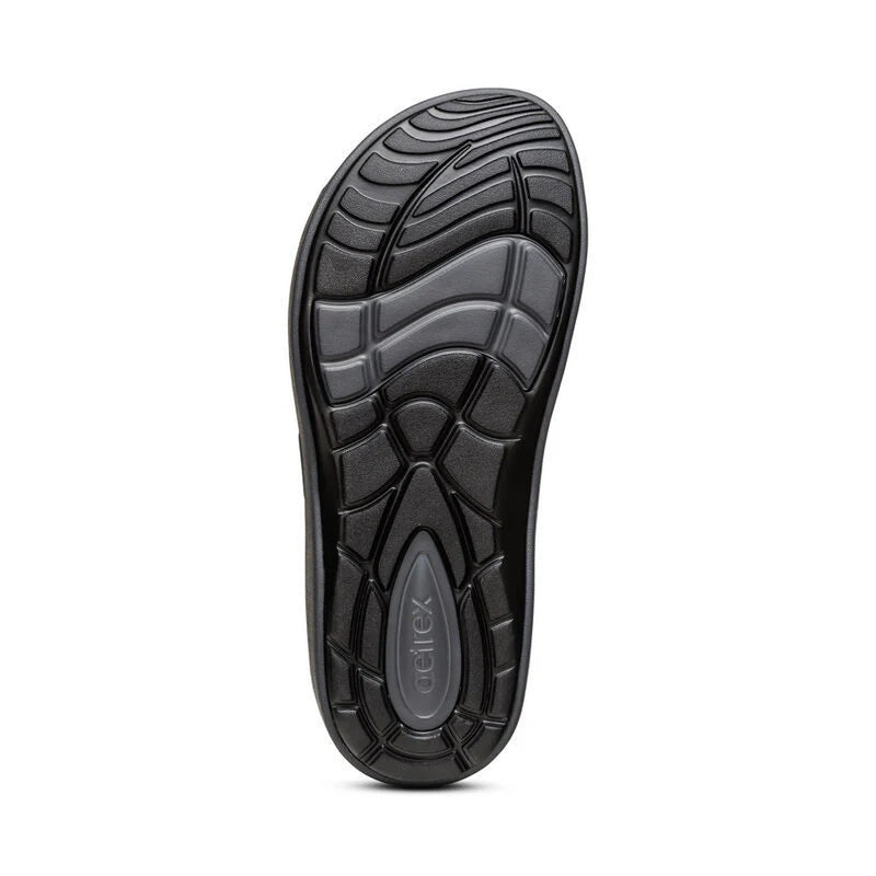 Black sole of a shoe with 'Deltex' branding on a white background