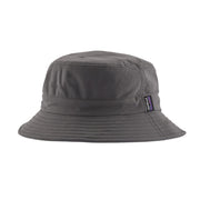 Gray bucket hat with a brand logo on a light gray background