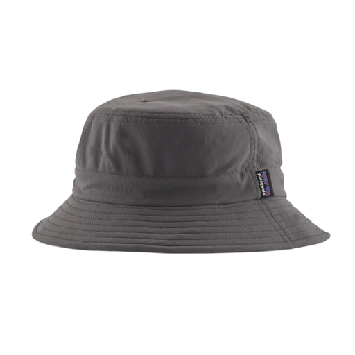 Gray bucket hat with a brand logo on a light gray background