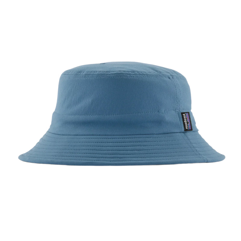 Blue bucket hat with a brand logo on a light gray background