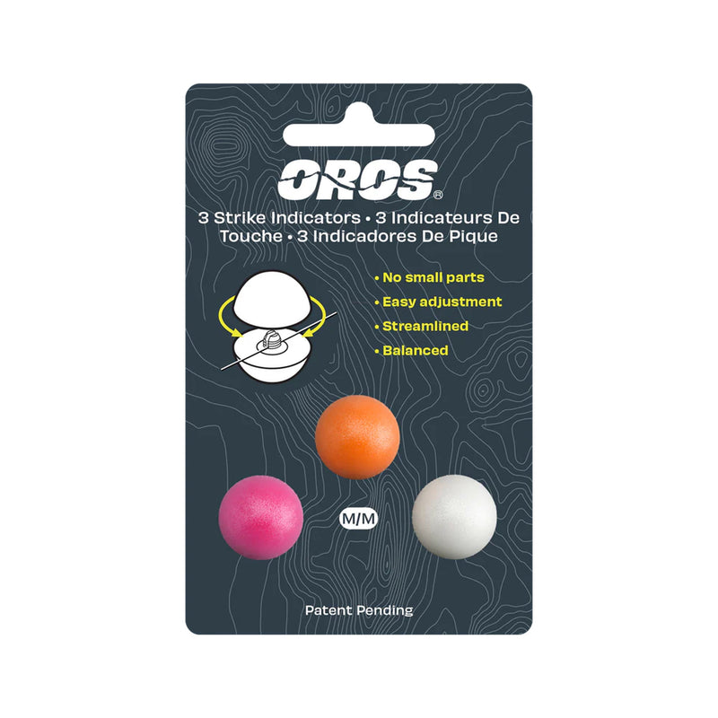A retail package of three OROS brand strike indicators in pink, orange, and white, mounted on a dark gray cardboard backing card with product details and diagrams.
