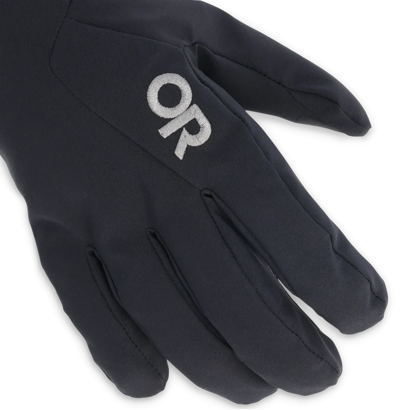 Close up of a black work glove with an Outdoor Research logo against a white background. 