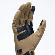 Bottom view of a hand wearing a light brown colored work glove with black pads against a white background. 