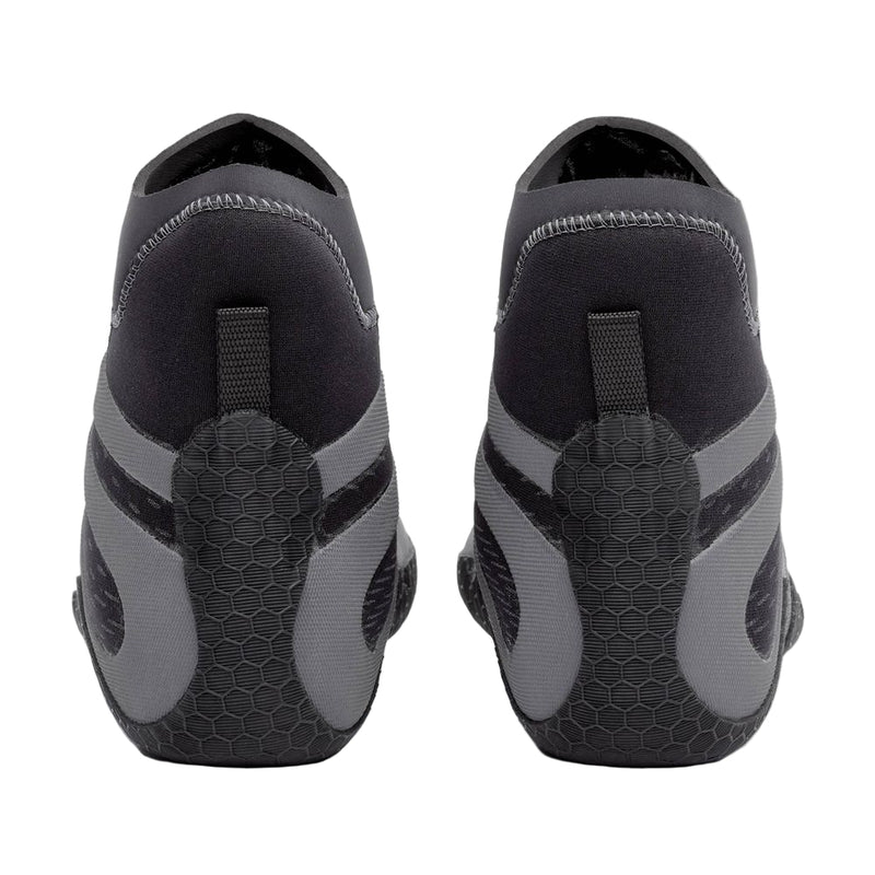 Black and gray wetsuit boots with unique sole design on a white background