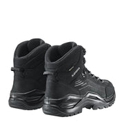 A pair of black hiking boots from behind on a white background
