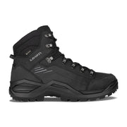 A black hiking boot on a white background