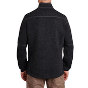 Dark gray fleece jacket worn by a person on a white background