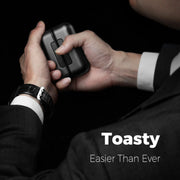 The Ocoopa UT2 Handwarmers shown in a man's hands, he's wearing a suit and a watch. Text reads Toasty easier than ever