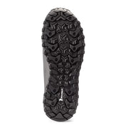 Close-up of a black hiking shoe sole with tread pattern on a white background