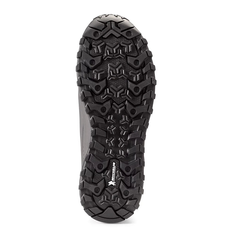 Close-up of a black hiking shoe sole with tread pattern on a white background