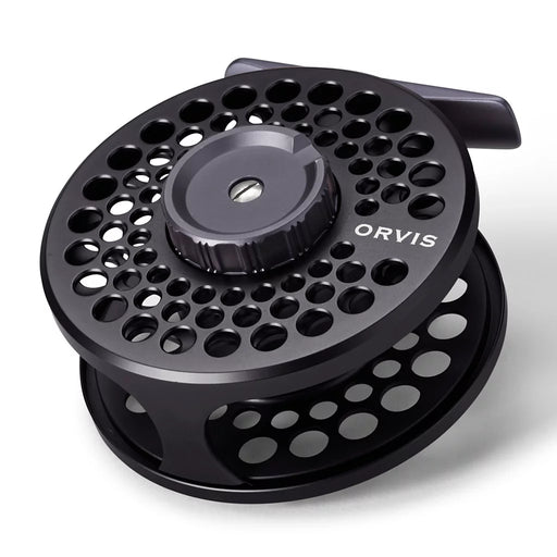 Black empty fishing reel with an Orvis logo on a white background.