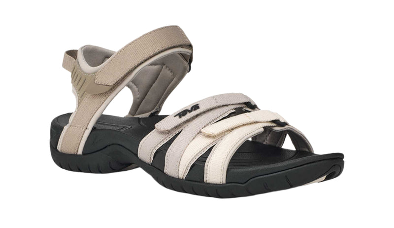 Beige and black sandal on a white background