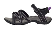 Black sandal with gray straps on a white background