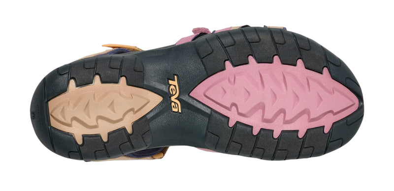 Close-up of a sandal sole with pink and black design on a white background