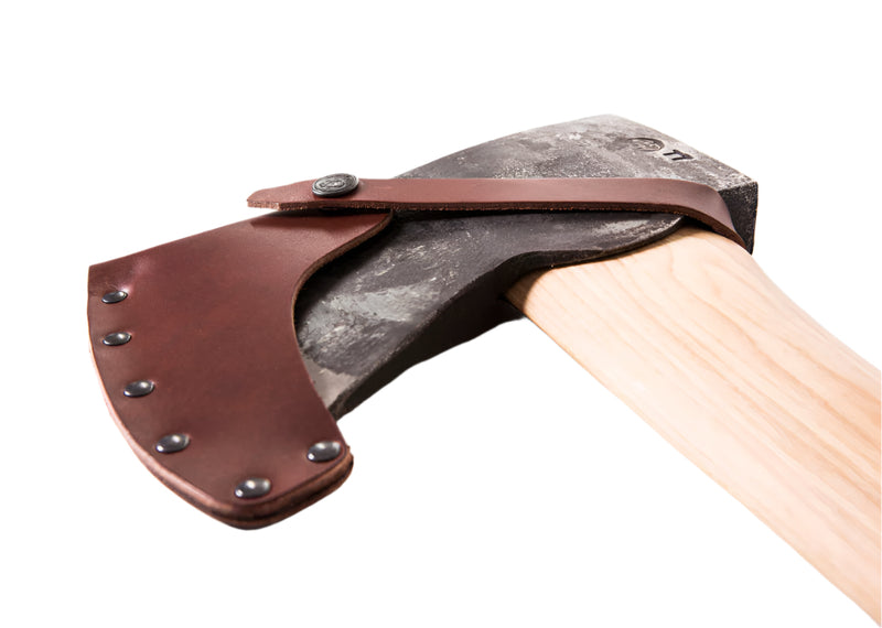 Axes with leather sheaths on a white background