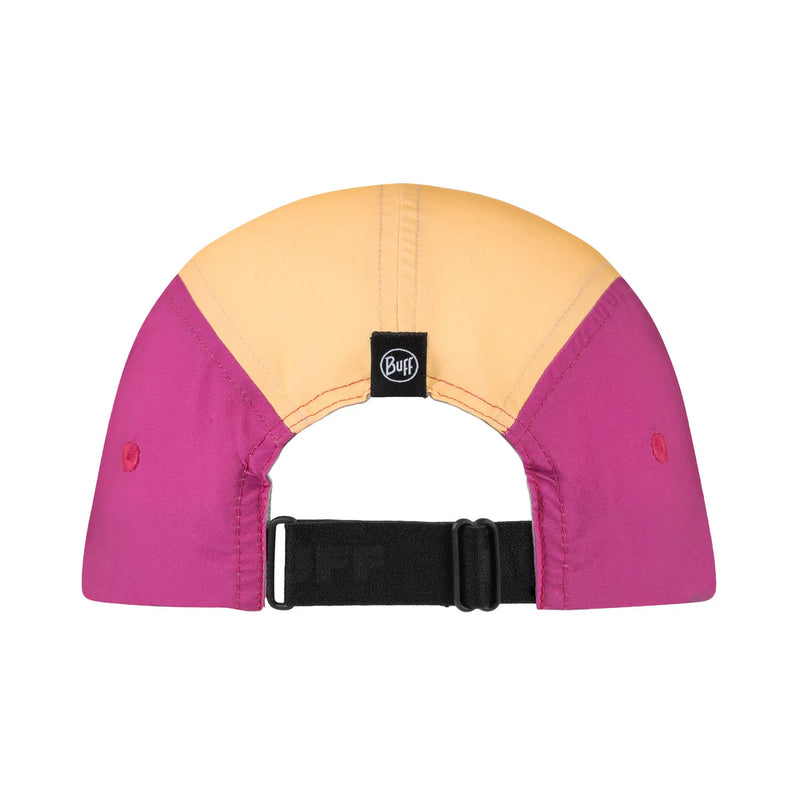 Rear view of a colorblock Buff baseball cap with a light peach crown, magenta side panels, and a black adjustable strap on a white background.