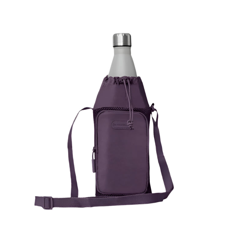 Purple crossbody bag with a bottle inside on a light gray background