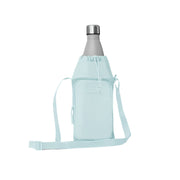 Light blue crossbody bag with a water bottle inside on a light gray background