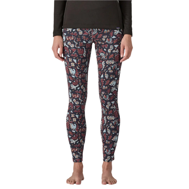 Floral patterned leggings worn by a person on a white background