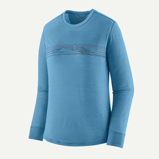 A blue long sleeve shirt on a white background