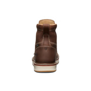 Brown leather boot on a white background