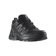 A Salomon low-top athletic shoe in black, featuring a textured synthetic upper, lace-up closure, and rugged sole, shown from a three-quarters angle on a white background.