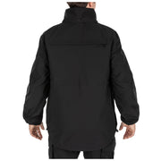 The back of a person wearing a black jacket on a white background