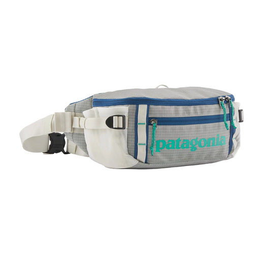 A gray waist bag with blue details on a white background