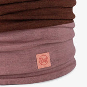 Multicolored neck gaiter with a visible brand logo on a light gray background
